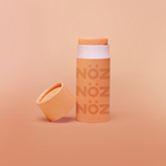 Load image into Gallery viewer, Nöz neon summer collection reef safe sunscreen in vibrant orange
